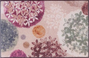 Türvorleger wash+dry Hydra Haze mit einem Blumendessin in lila und violett