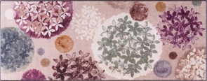 Türvorleger wash+dry Hydra Haze mit einem Blumendessin in lila und violett