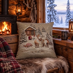 Sofakissen mit Rentier in Winterlandschaft